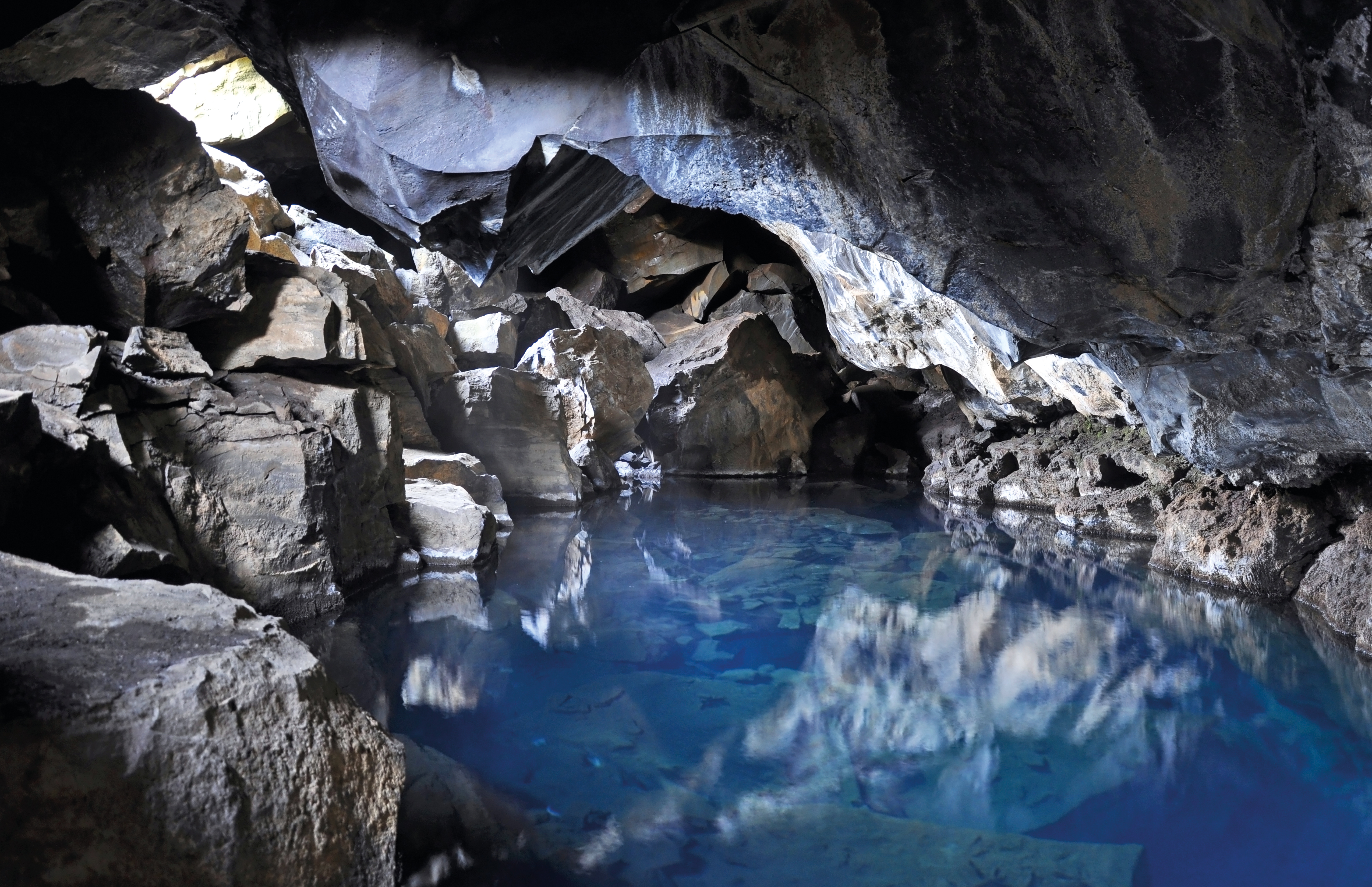 a cave with water.