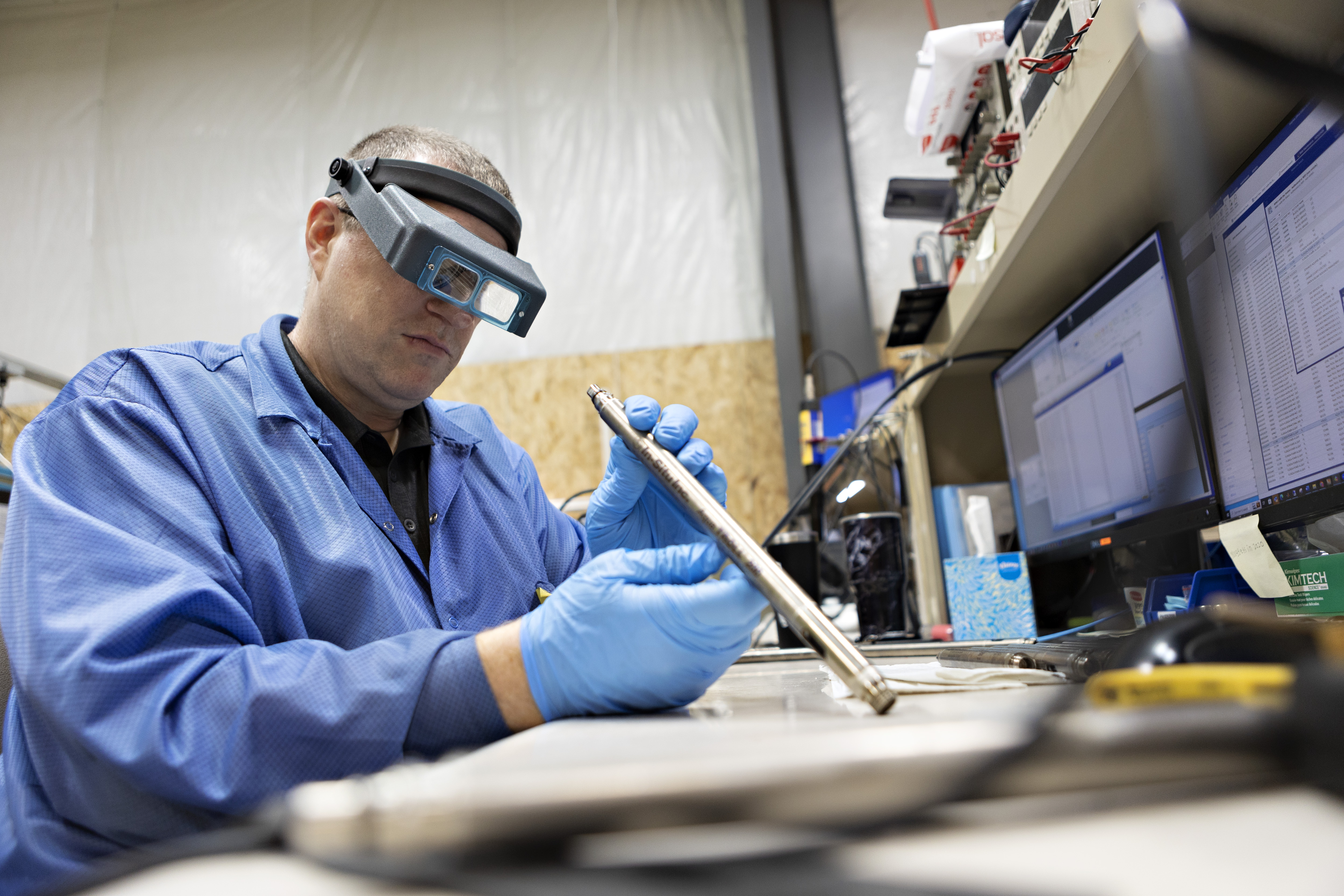 service tech examining AT200