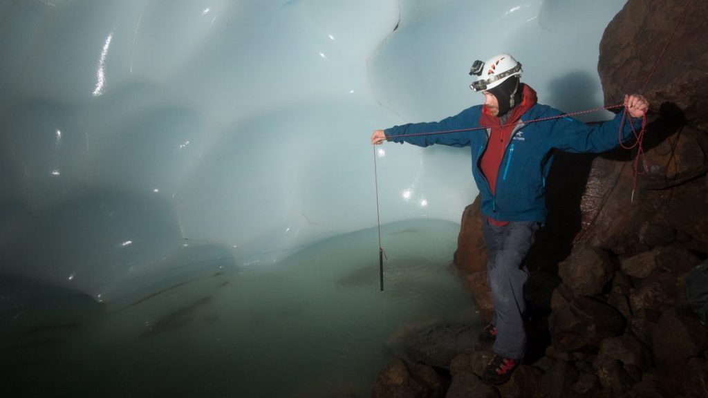 A man in an ice cave.