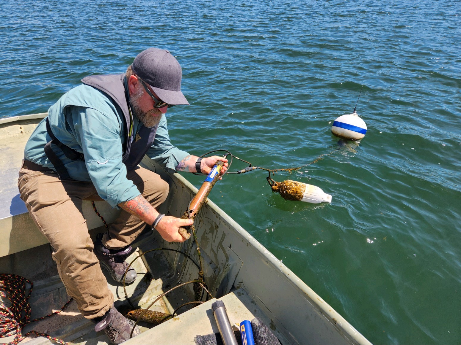 Dr. Skibo in boat with multiparameter sonde 600 