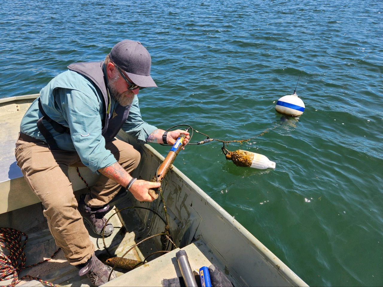 Dr. Skibo in boat with multiparameter sonde 600